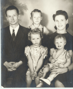 Joanne, Larry, Linda, Uncle John, Aunt Hilda.  Joanne is the very serious little girl in center of grouping.